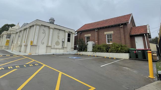 There are only four car spots at the temple but hundreds of worshippers.