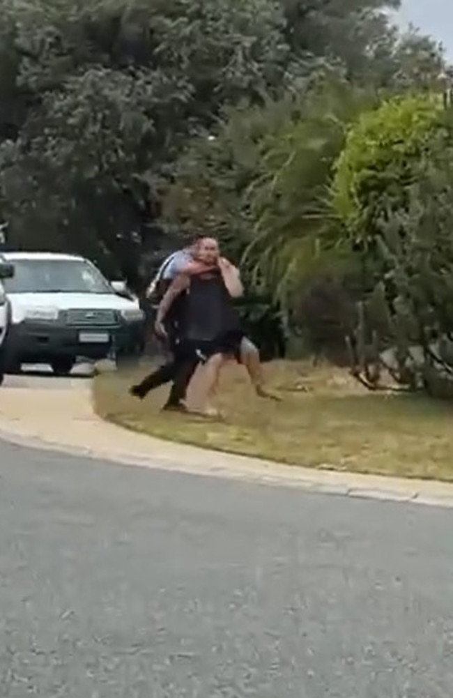 An officer tackled a man WWE-style after a two-hour car chase. Picture: TikTok