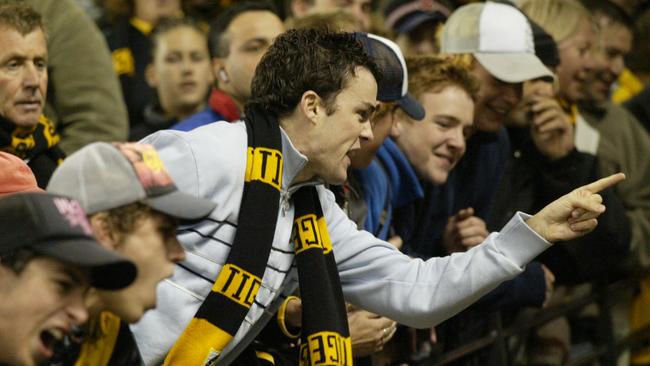 A Richmond fan makes his point following teams loss to Adelaide in 2004.