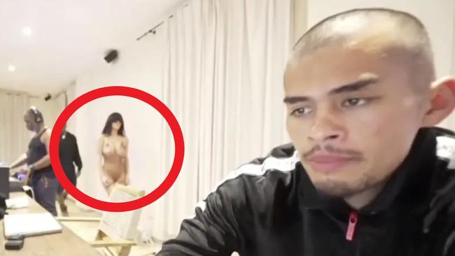 Bianca Censori in the back of the livestream.