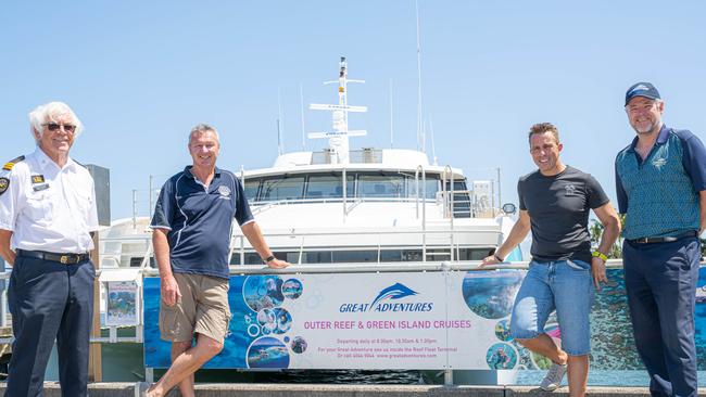 Cairns Volunteer Coastguard Commander John Wyatte, Reef Restoration Foundation CEO Ryan Donnelly, Pilot, Triathlon identity and Great Barrier Reef Ocean Swim founder Craig Needham and Great Adventures Managing Director Tony Baker at the Reef Fleet Terminal pontoon in Cairns. Picture: Emily Barker.