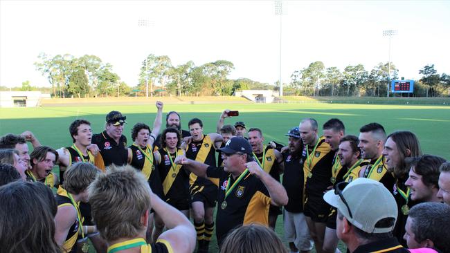 Tigers coach Adi Campbell leads the team song after the Grafton Tigers beat the Sawtell Toormina Saints in the 2020 AFL North Coast grand final. Photo: Tim Jarrett