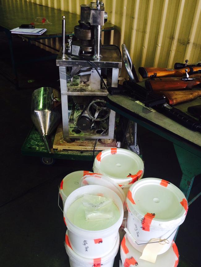 Precursor chemicals and the pill press that were seized during the raid on the Walker Flat property in February 2014. Picture: Sam Kelton