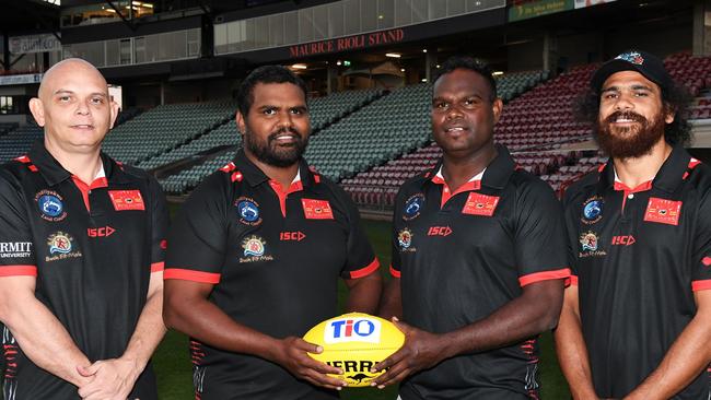 Tiwi Bombers senior coaches Jamie Scrymgour and Shane Tipuamantimirri, second and third from left, with assistants Brenton Toy, at left and Cyril 'Junior Boy' Rioli at right. Picture: Felicity Elliott/AFLNT Media