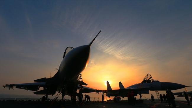 J15 fighter jets on China's operational aircraft carrier, the Liaoning, during a drill at sea in 2018. Picture: AFP