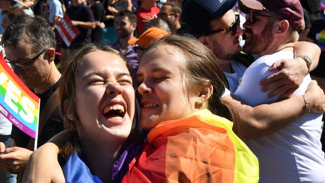 Supporters react with pure joy at the announcement. Picture: AFP