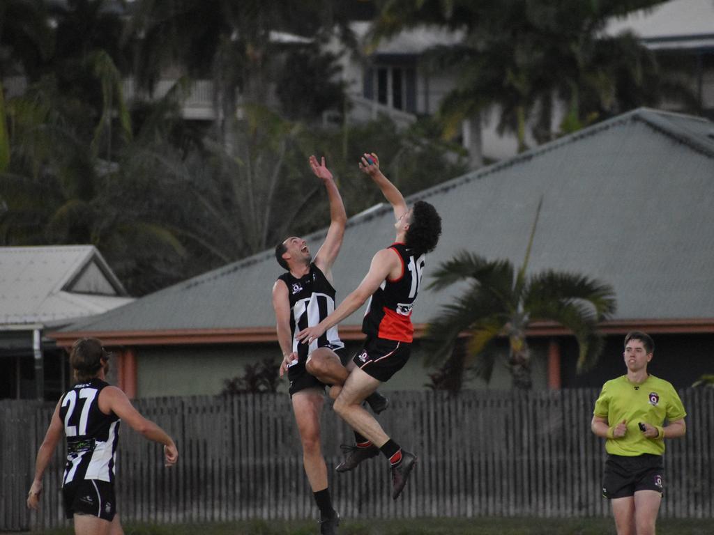 Nick Thiele and Tyler Duck in the North Mackay Saints v Mackay Magpies AFL premier grand final, September 11, 2021. Picture: Matthew Forrest