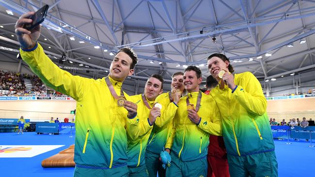 Sam Welsford, Leigh Howard, Alex Porter, Jordan Kerby and Kelland O'Brien celebrate winning gold at the Anna Meares Velodrome. Picture: AAP Image/Dan Peled