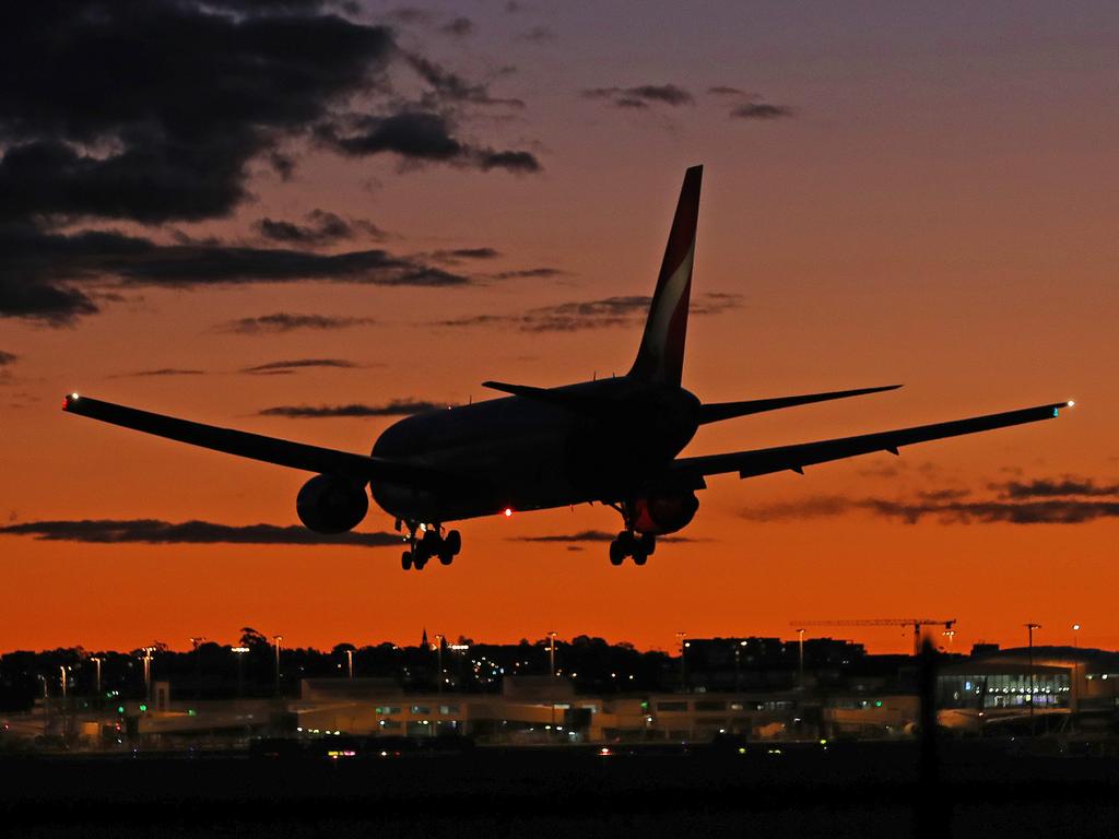 A Qantas plane comes in to land at Sydney Airport. Picture: Toby Zerna