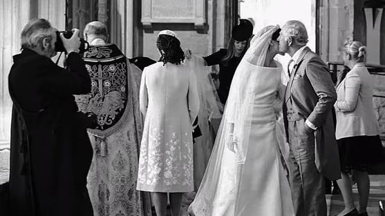 Prince Charles kisses Meghan Markle on her wedding day. Picture: Netflix