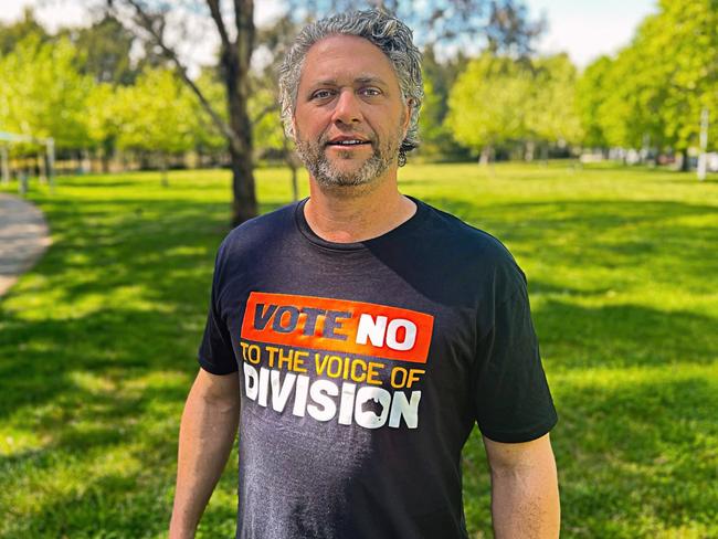 12/10/2023: Matthew Sheahan wearing his NO t-shirt outside Advance office in Canberra. He was refused entry to the Centre for Australian Democracy the day before for wearing the shirt.