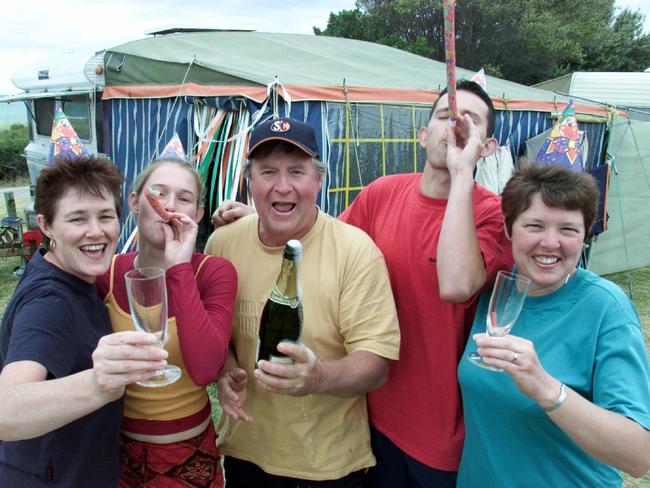 This family has been celebrating the new year in Rye for 35 years and 2001 was no different. Kerri and Adrian Nash with Kerri's sister Ann Bramstedt (far right) and Ann's children David, 19 and Kelly, 17. Picture: Ian Currie