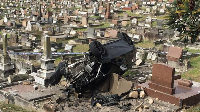 The car crashed through a wall and into a cemetery. Picture: Sam McBeath