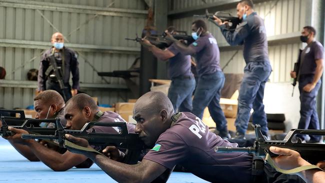 China Police Liason Team officers training Solomon Islands police officers. Picture: AFP