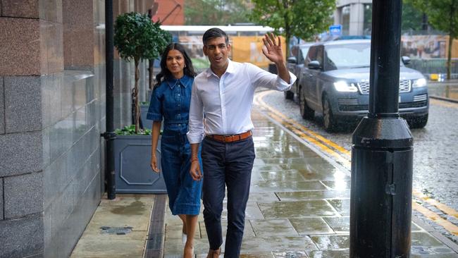 Rishi Sunak and his wife Akshata Murthy arrive at their hotel in Manchester on Saturday. Picture: Getty Images