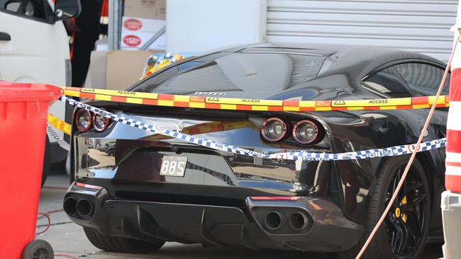 Police examine the crime scene after the kidnapping.