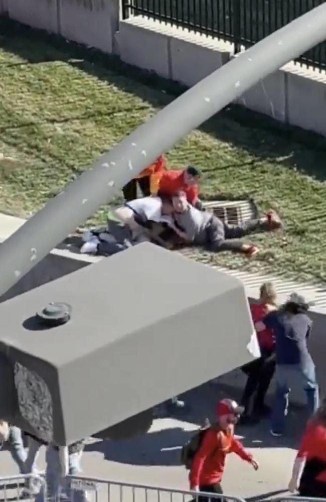 The incredible moment Chiefs’ fans tackle an alleged gunman to the ground. Picture: X