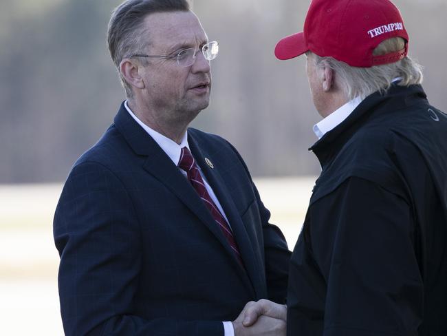 Mr Collins and Mr Trump. Picture: AP