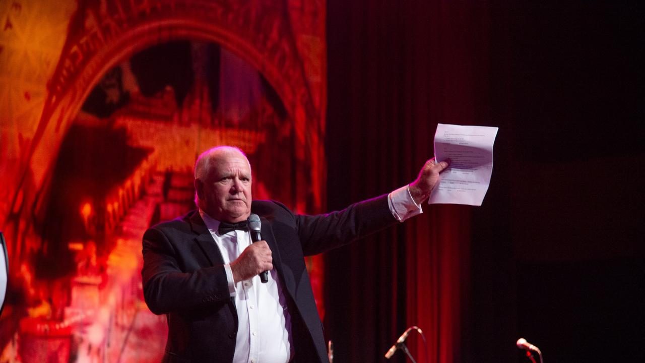 Auctioneer Mark Stephens from Helping Hand Group rallies the crowd during the live auction at the Mayor's Charity Ball on Saturday, May 15, 2021. Picture: Mackay Regional Council