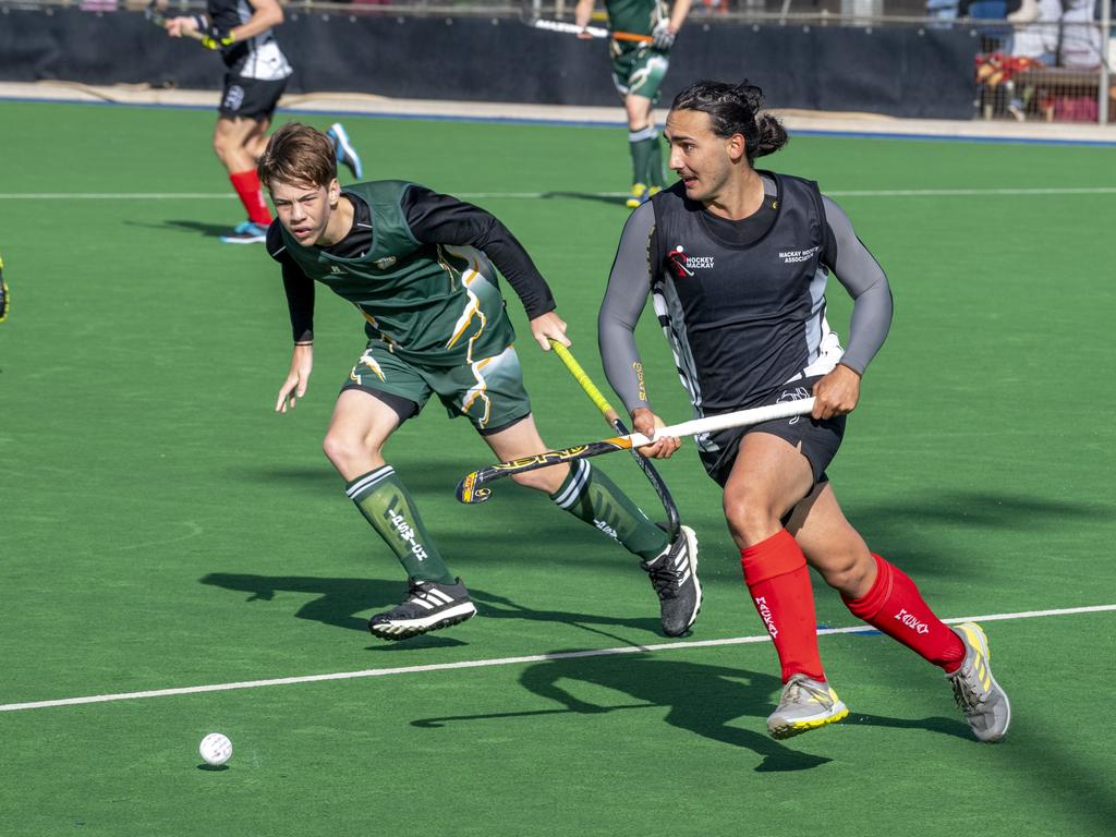 Rhys Stenzel, Ipswich and Noah Gauci, Mackay. Ipswich vs Mackay. Hockey Queensland Championship. Saturday, May 1, 2021. Picture: Nev Madsen.