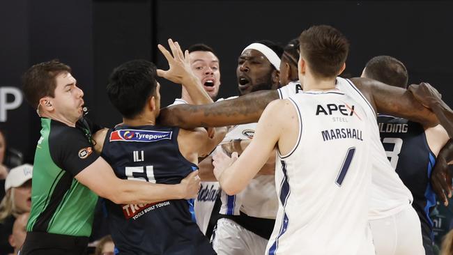 MELBOURNE, AUSTRALIA - NOVEMBER 17: Shea Ili of Melbourne United and Montrezl Harrell of the Adelaide 36ers fight during the round nine NBL match between Melbourne United and Adelaide 36ers at John Cain Arena, on November 17, 2024, in Melbourne, Australia. (Photo by Darrian Traynor/Getty Images)