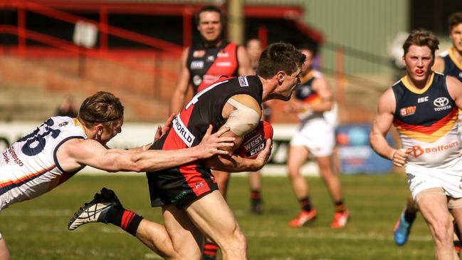 SANFL: West Adelaide v Adelaide at West home ground, Richmond, Sunday August 26, 2018, West's Jono Beech marks in the forward lines — pic AAP/MIKE BURTON