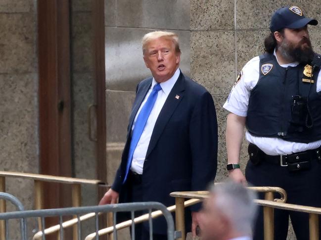 Former US President and Republican presidential candidate Donald Trump leaves Manhattan Criminal Court after he was convicted.