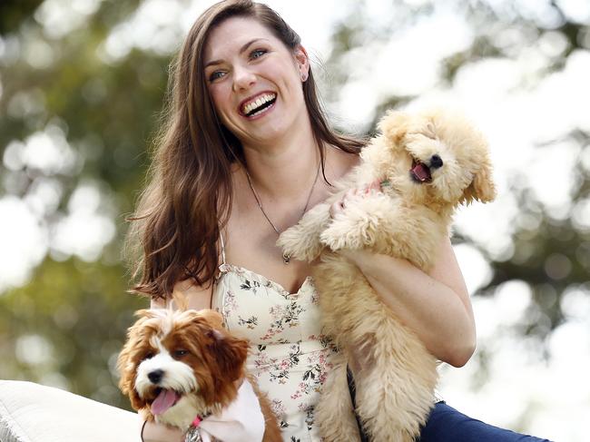 SUNDAY TELEGRAPH - 26/2/20Young soprano from Opera Australia, Danita Weatherstone, pictured with dogs in Sydney today to promote upcoming animal auditions for roles in La Traviata. Picture: Sam Ruttyn