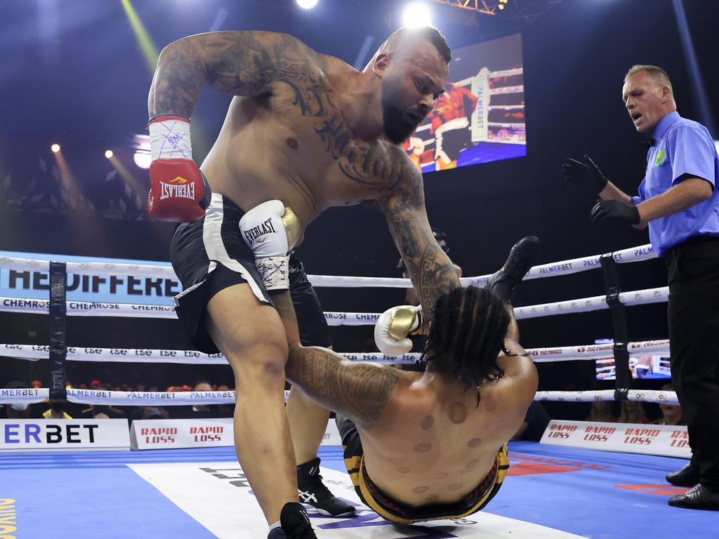 Alex Simon (L) punched his downed opponent. Picture: Mark Evans/Getty