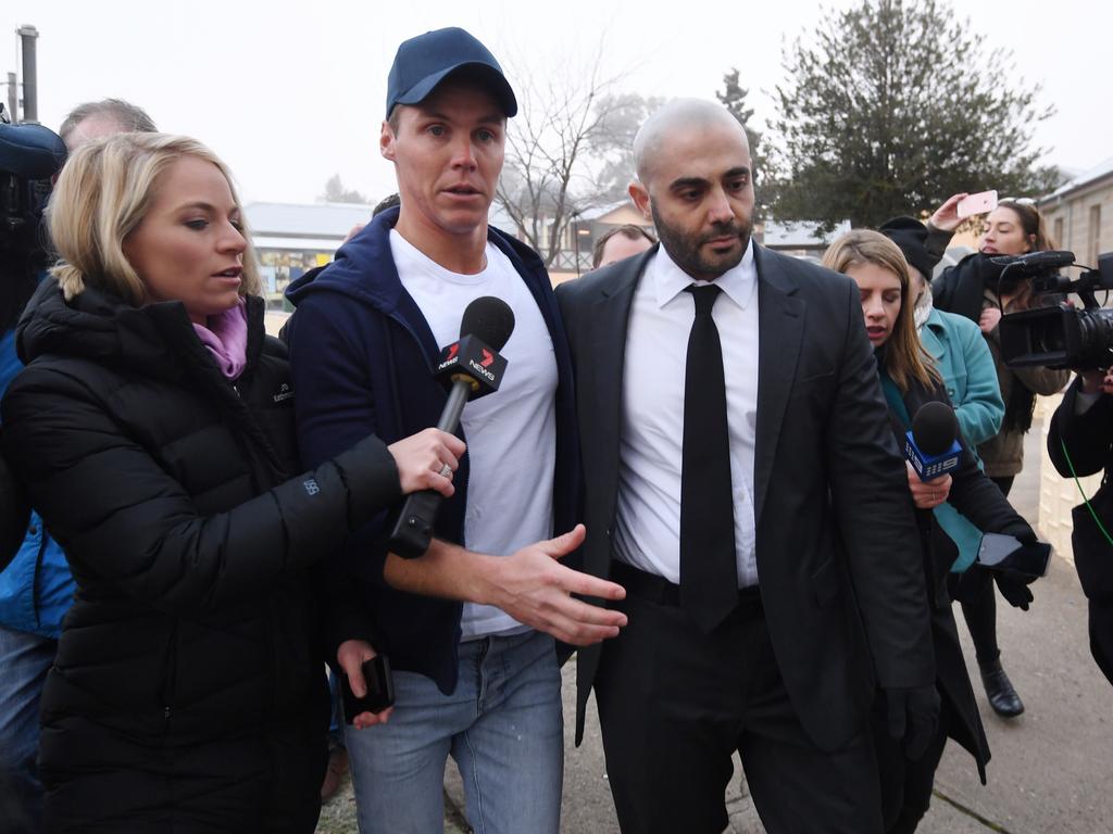 Oliver Curtis is surrounded by media as he leaves Cooma Correctional Centre in Cooma, NSW, Friday, June 23, 2017. The disgraced stockbroker, and husband of Roxy Jacenko's, has been released from the centre after serving one year behind bars for insider trading. (AAP Image/Lukas Coch) NO ARCHIVING