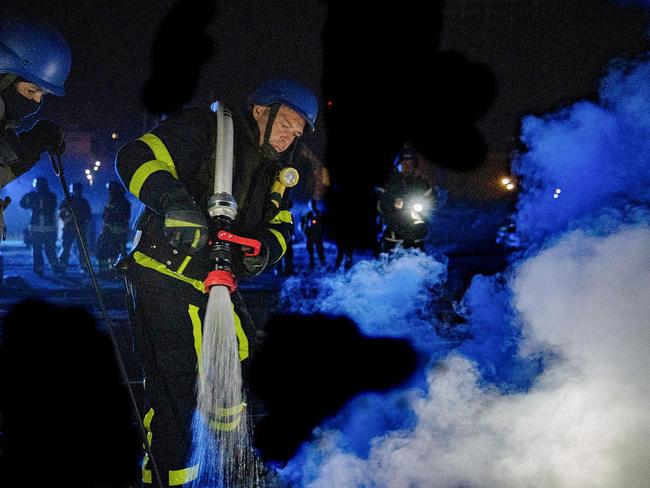 Rescuers working at the site of a drone attack in Kyiv. Russian forces launched 32 explosive drones over Ukraine on September 9. Picture: Handout / Ukrainian Emergency Service / AFP