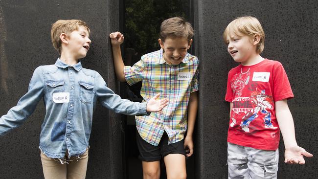 Hudson Richardson, nine, Andrea Lassandro, 10, and Liam Barnsley, nine, chat during auditions. Picture: Justin Lloyd