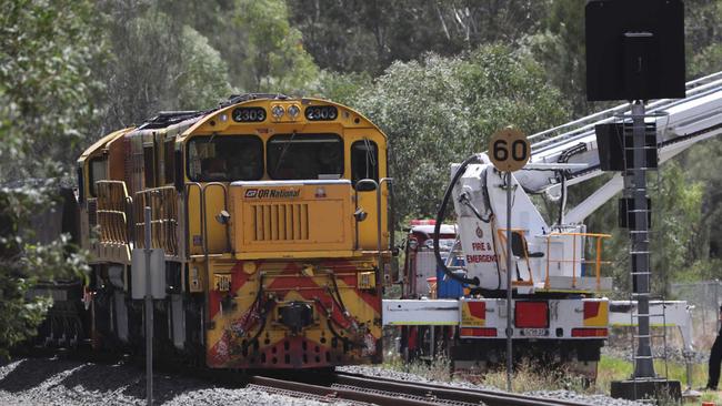 Extinction Rebellion on Tuesday stopped this coal from entering Brisbane after two activists allegedly climbed atop the trains. Picture: supplied.