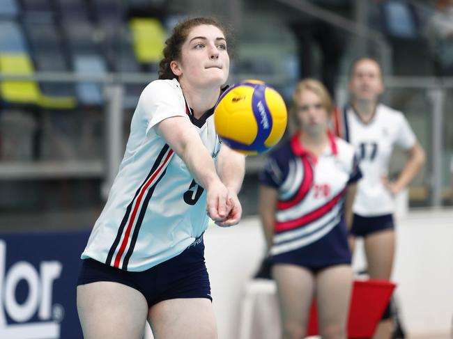 Action during the Australian Volleyball Schools Cup at the Gold Coast Sports &amp; Leisure Centre. Isabelle Handbury of Billanook. Photo: Tertius Pickard