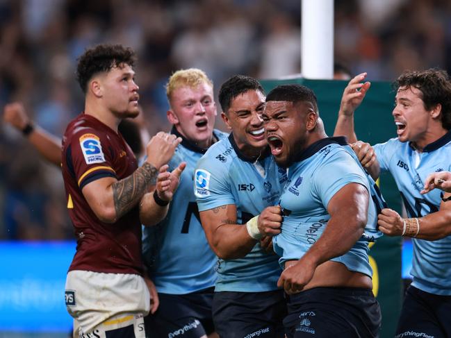 SYDNEY, AUSTRALIA - FEBRUARY 14: Siosifa Amone of the Waratahs celebrates the match winning try during the round one Super Rugby Pacific match between NSW Waratahs and Highlanders at Allianz Stadium, on February 14, 2025, in Sydney, Australia. (Photo by Darrian Traynor/Getty Images)