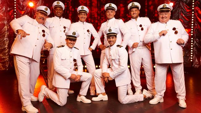 The stripping crew. Rear (l-r): Robert DiPierdomenico, Lote Tuqiri, Sam Moran, George Burgess, Brendan Fevola and John Wood. Front (l-r): Todd McKenney and Matty J. Picture: Seven