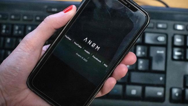 The ANoM app appears on the screen of a smartphone in Paris, on June 8, 2021. - Some 250 people were arrested in Sweden and Finland in the global sting on organised crime, authorities said on June 8, 2021, using phones planted by the US FBI, law enforcement officers were able to read the messages of global underworld figures in around 100 countries as they plotted drug deals, arms transfers and gangland hits on the compromised ANOM devices. (Photo by Olivier MORIN / AFP)