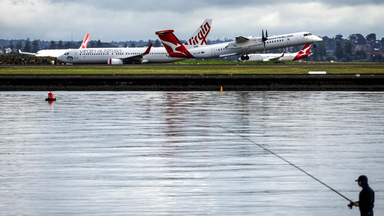 Qantas and Virgin Australia will have to provide more detailed information about their performance to government and travellers, particularly around delays and cancellations. Picture: AFP