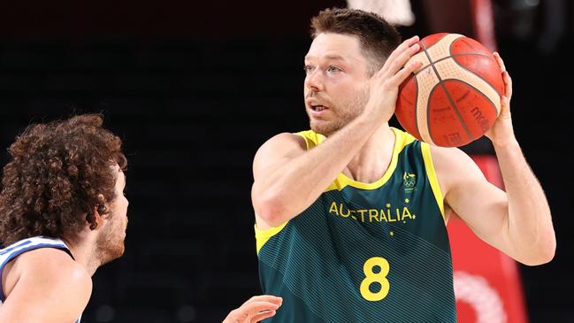 SAITAMA, JAPAN - JULY 28: Matthew Dellavedova #8 of Team Australia looks to pass against Italy during the second half of a Men's Preliminary Round Group B game on day five of the Tokyo 2020 Olympic Games at Saitama Super Arena on July 28, 2021 in Saitama, Japan. (Photo by Gregory Shamus/Getty Images)