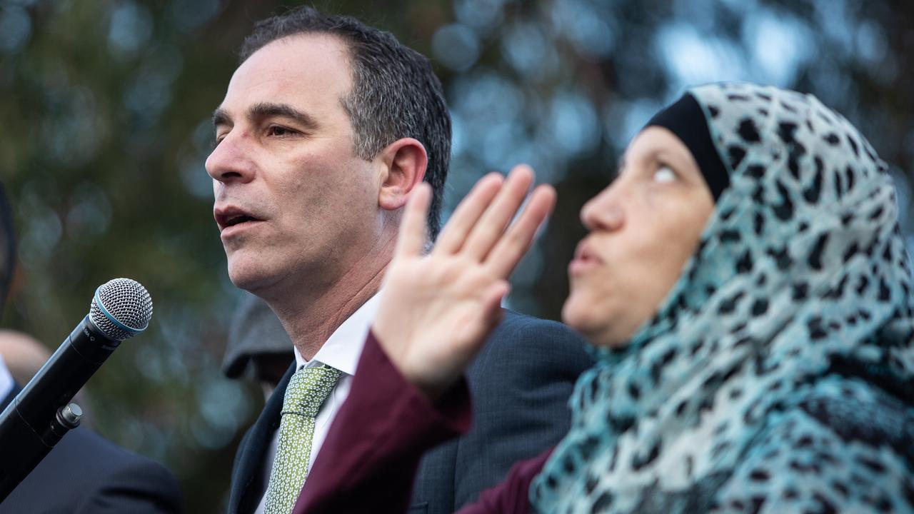 Lakemba state Labor MP Jihad Dib speaks as a sign language expert interprets after Eid prayers outside Lakemba Mosque as Picture: Julian Andrews. Photos can be purchased at newsphotos.com.au