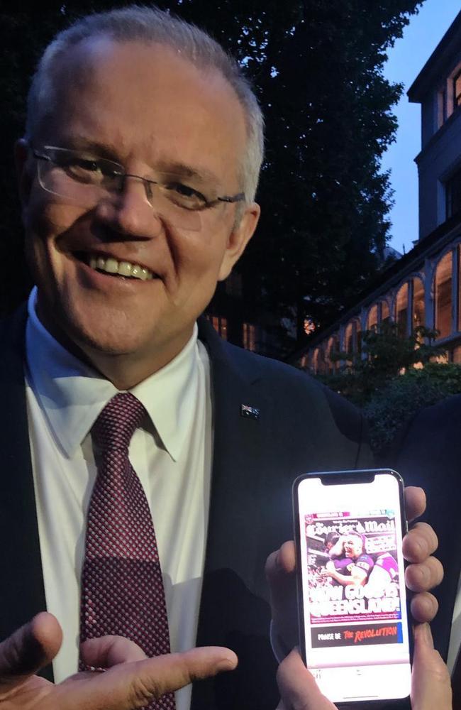 Prime Minister Scott Morrison (left) might not have liked the result of State of Origin, but he loved The Courier-Mail's front page.