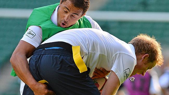 Jason Robinson goes the groin-tackle on Prince Harry