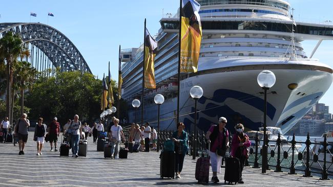 Cruise ship passengers disembark from the Princess Cruises owned Ruby Princess at Circular Quay in Sydney on March 19. Picture: AAP