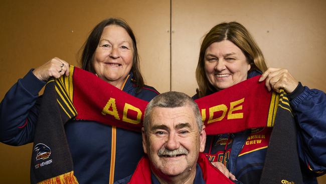 Tina (right) and Peter Kauschke with fellow Crows superfan Carmel Johnston. Peter is currently facing a major health battle after a stroke. Picture: Matt Loxton