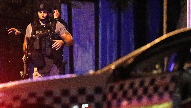 Police at the scene of the hostage-taking and shootout in Melbourne’s Brighton last night. Picture: Tim Carrafa