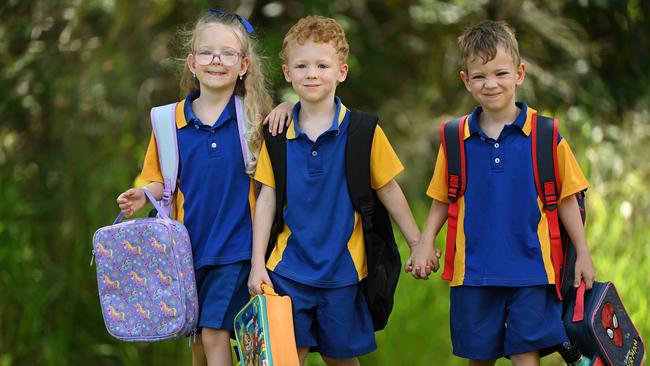 13/01/2023: Triplets Elaina , Aiden and Clay,  Davey 5, mum Lorren Davey,  getting ready for school, and all the costs involved, at a park in Birkdale,  Brisbane. pic Lyndon Mechielsen