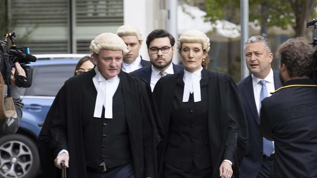 Accused Bruce Lehrmann (centre) is pictured walking with lawyers Steven Whybrow and Katrina Musgrove. Picture: Gary Ramage