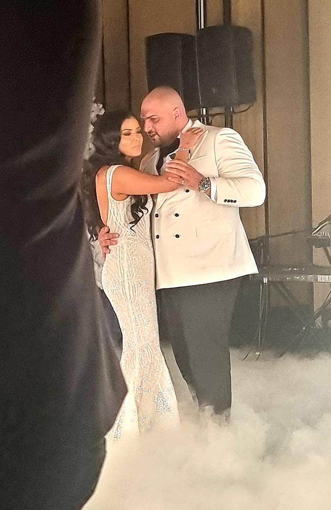 Robbie and Marina dance during their wedding.