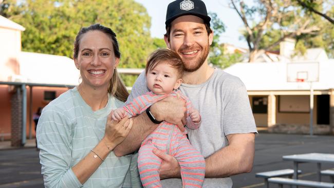 Zhaan and John Fargher with their daughter Iris at Forest Lodge Public School. Picture: Monique Harmer