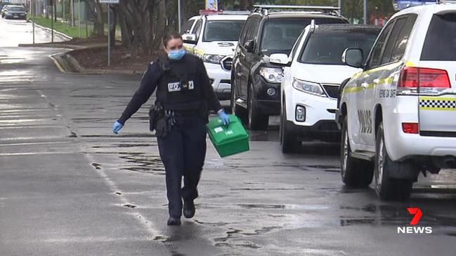 A police officer at the scene in Windsor Gardens, after a student was assaulted at Avenues College. Picture: 7NEWS